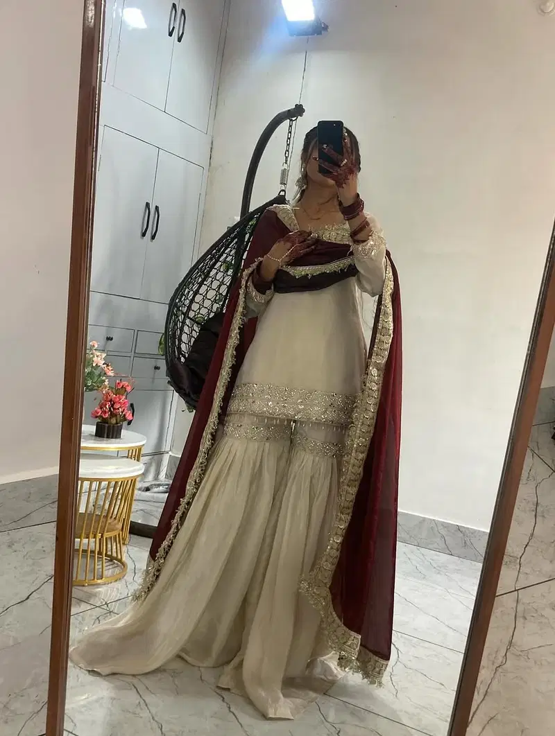Dhuvamika Cream Chinon Silk Embroidered Kurti With Sharara And Dupatta